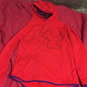 A girls under armour pink sweatshirt